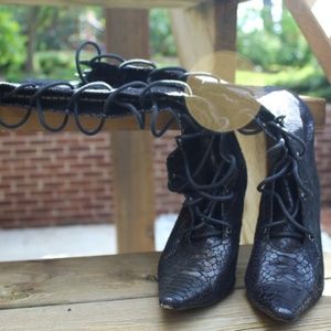 Calf-High Snakeskin Steletto Boots